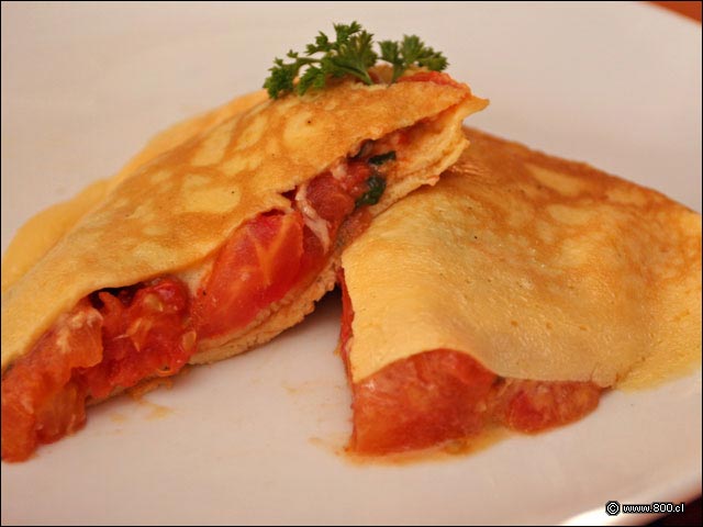 El cremos interior de Omellete de Tomates Asados - Qunoa Restaurante