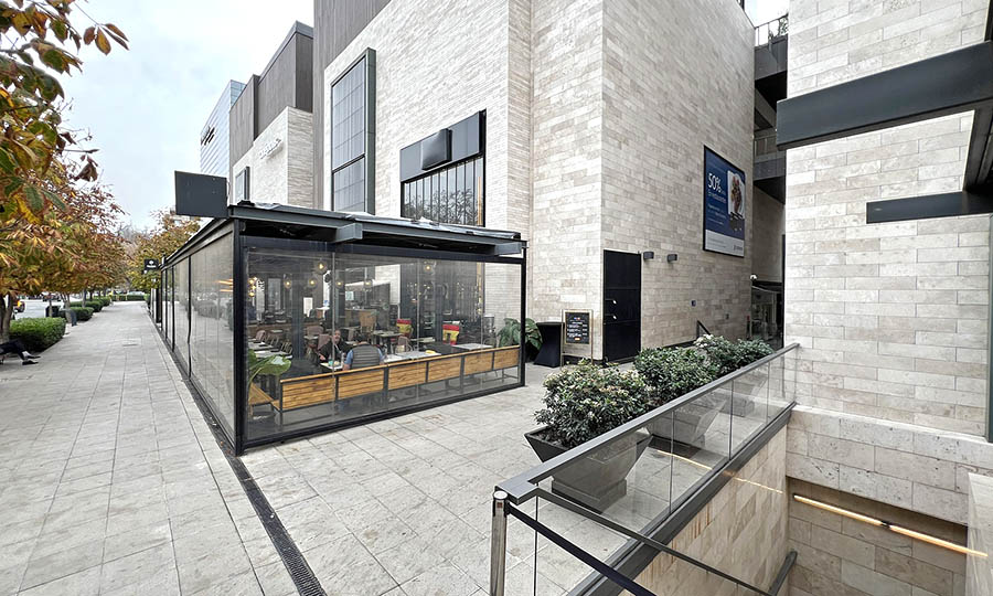 Fachada de Musu en el costado de Casa Costanera - Musu - Casa Costanera