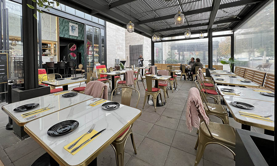 La terraza techada de Musu restaurante - Musu - Casa Costanera
