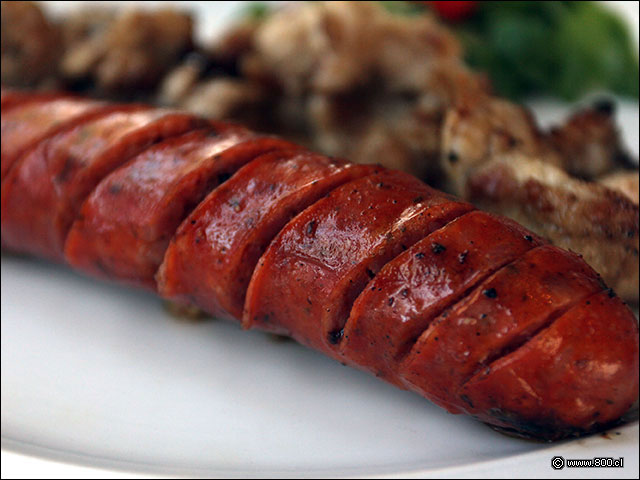 Longaniza a la parrilla como picoteo en Cvico Las Condes - Cvico (Las Condes)