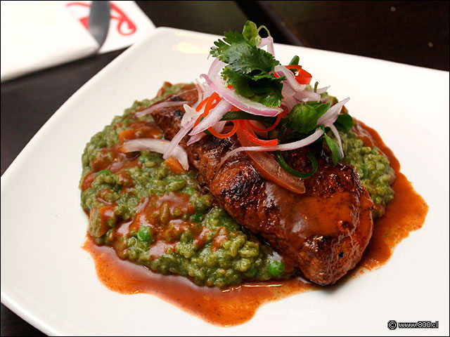 Risotto verde con bistec de asiento con salsa anticuchera - Rocoto Las Condes