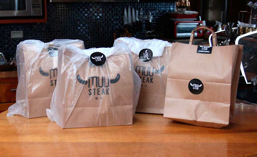 Llegada del delivery - Muu Steak - Parque Arauco