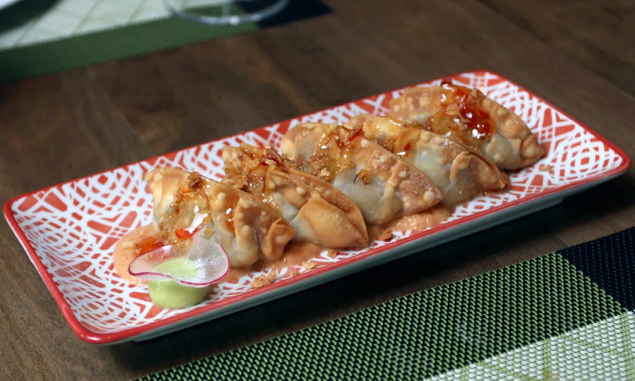 Empanadas de pato confitado y salsa dulce - Malakita Resturant
