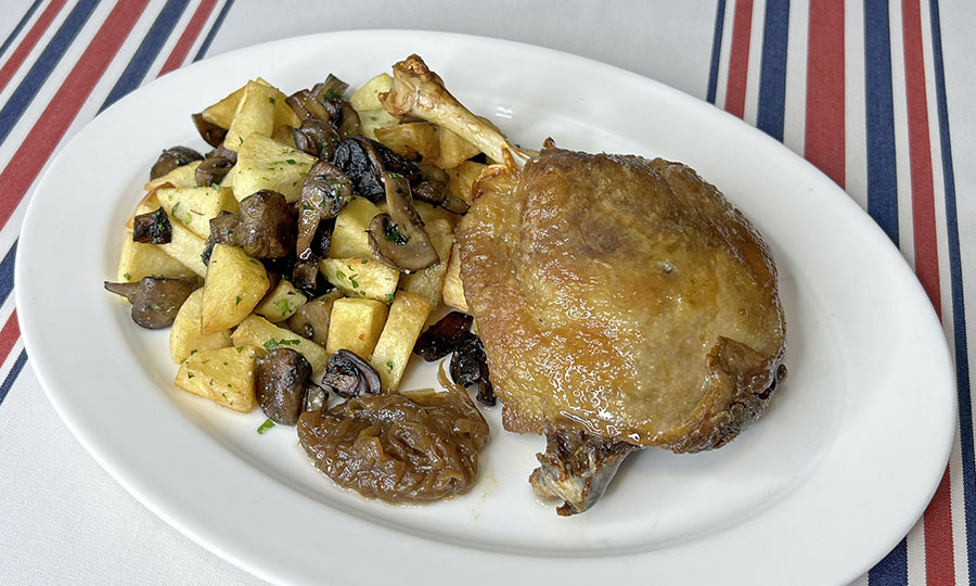 Confit de Canard con papas y championes