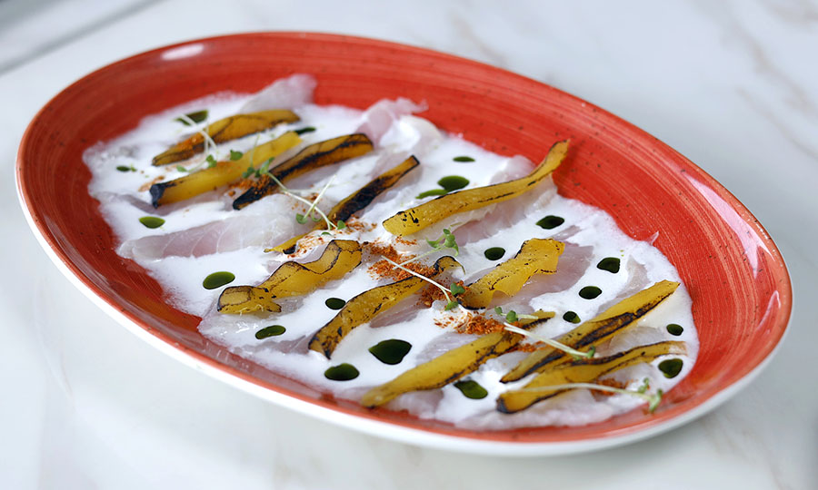 Tiradito de leche de coco con pescado del da