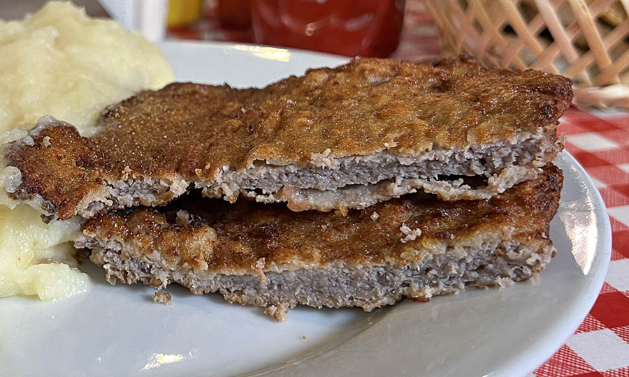 Muy buena Escalopa milanesa con agregado de pur y su limn