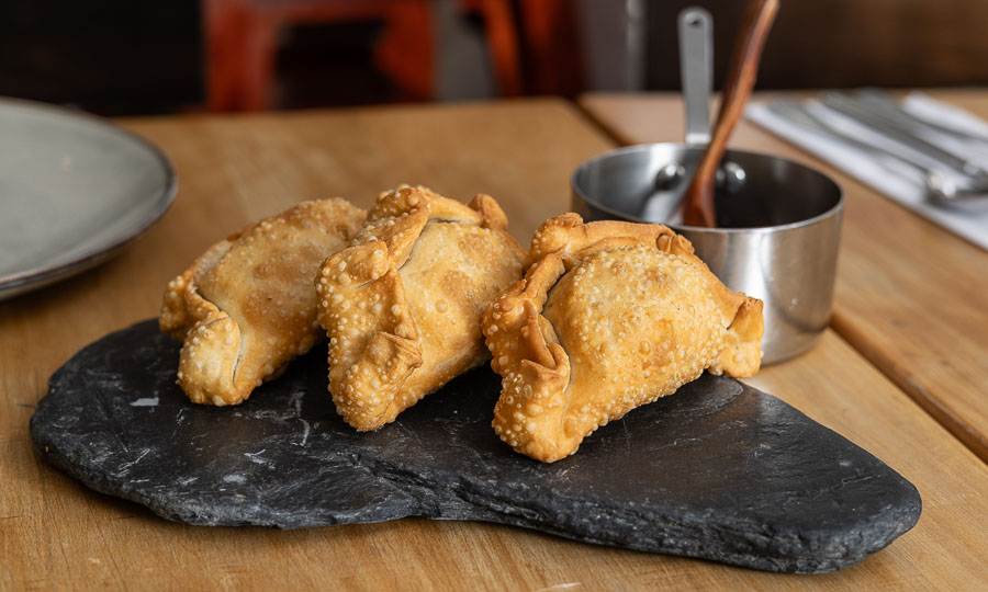 Las exitosas empanada fritas de mechada queso de Mulato