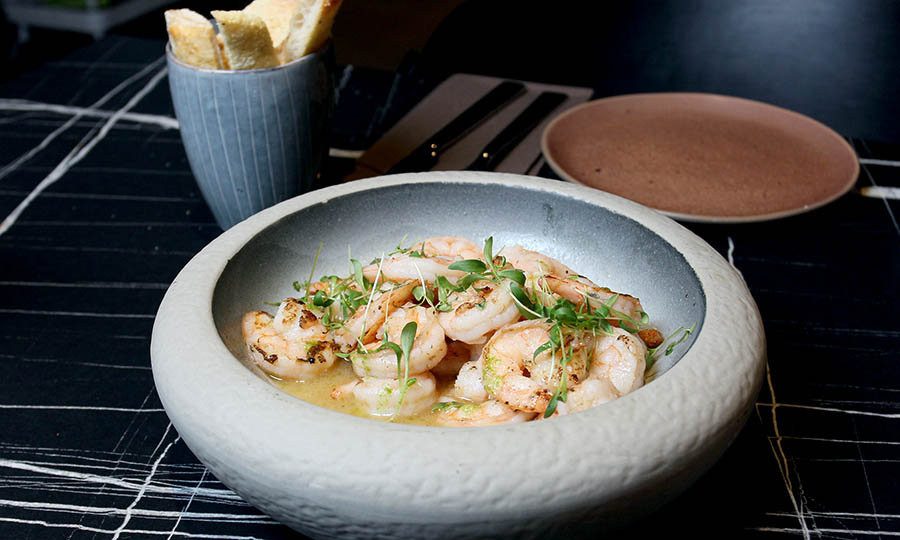 Camarones flamb con pisco
