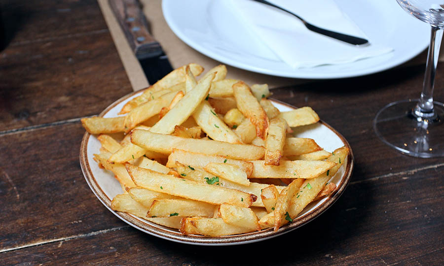 Papas fritas provenzal - La Hacienda Machal