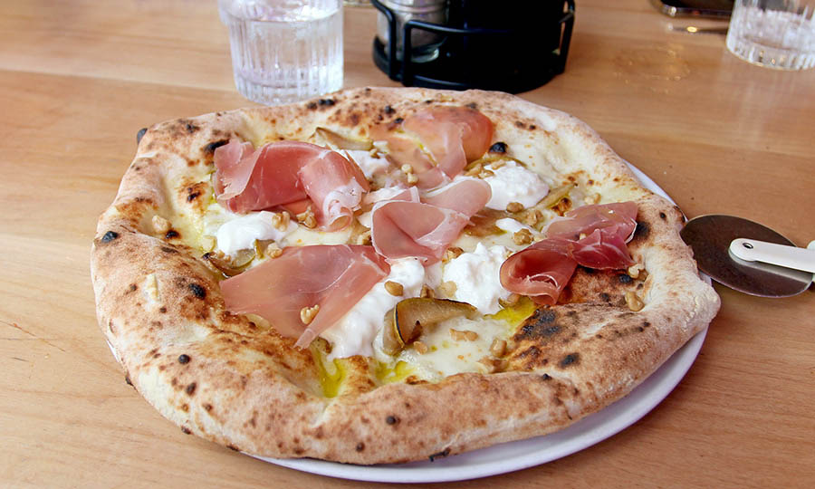 Pizza Stella de prosciutto y pera